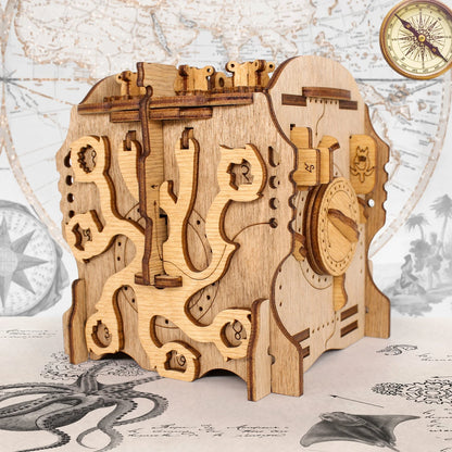 Nautilus mechanical puzzle box with nautical map background — wooden brain teaser showing anchor and compass dial mechanisms